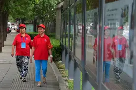 走近北京“神秘组织”西城大妈：红墙脚下的守护与传承图片