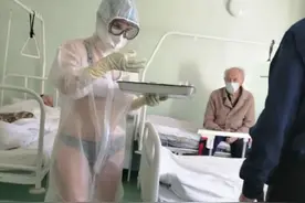 嫌热，俄罗斯一护士在透明防护服内穿比基尼工作图片