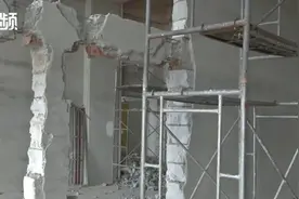 土豪业主买下整层楼拆墙装修酒店，疑因震动大导致邻居家墙面开裂图片