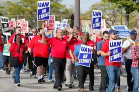 美国工会是“助人”还是“吃人”图片