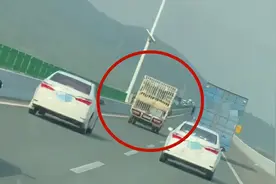 两货车在珠海路上并排龟速行驶，多辆车被迫缓行随后！结果货车司机被罚了图片