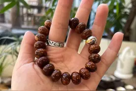 盘了10年的星月算盘珠，焦糖色，包浆玉化，颗颗像玻璃珠。图片