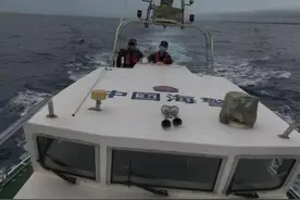 海南文昌四人赶海摸螺遇险 两人获救图片