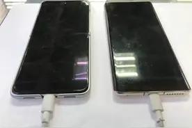 还在边充电边玩手机？很危险！图片