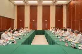 邹磊会见中国能建党委副书记、总经理倪真图片